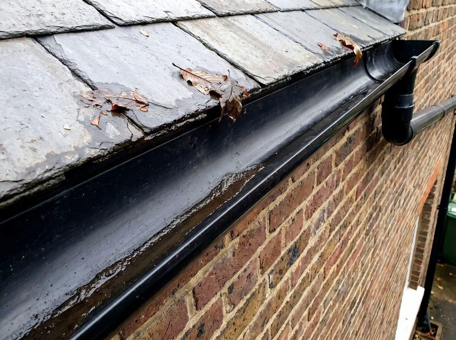 Gutter cleared back to bare plastic along its length
