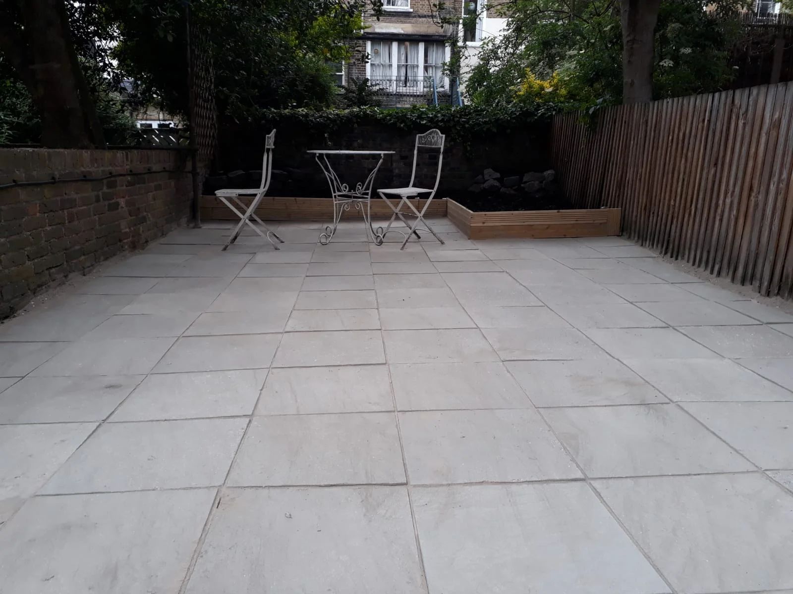 Paved patio cleaned back to bare stone